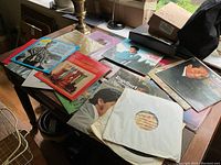 Photo of several LP records spread out on a table including Elvis, Kate Smith, Engelbert Humperdinck and others.