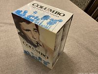 Boxed set of Columbo The Complete Series with approx. seasons 1-7 shown on the front cover, featuring a portrait of Columbo.