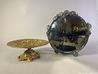 Both items in the lot together, showing the vanity mirror and pedestal compote side by side