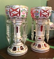 Front view of both candle holders side by side