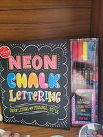 Boxed Neon Chalk Lettering kit including book and colorful chalk markers with accessories