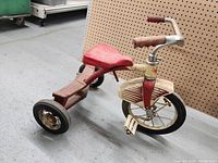 Full side view of vintage AMF Junior tricycle showing overall condition and design.