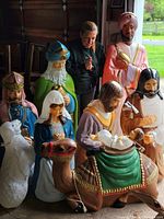 All nine figurines grouped together inside garage