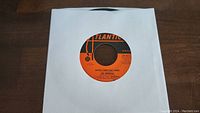 Good Times Bad Times vinyl single showing Atlantic Records orange label in white sleeve