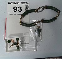 Full set including jade bracelet, cross pendant in a bag, and earrings in a small plastic box