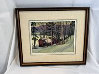 Full front view of the framed painting on white draped background