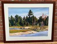 Framed oil painting showing full landscape and frame
