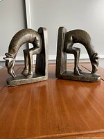 Pair of giraffe bookends side by side showing overall shape and size