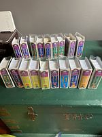 Disney Masterpiece Collection volumes in original plastic cases showing tops and sides with colorful labels.