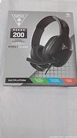 Box of Turtle Beach Recon 200 gaming headset with front packaging information showing compatibility with multiple platforms including Xbox, PlayStation, and Nintendo Switch.