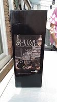 Box of Guitar Classics acoustic leaf guitar money bank.