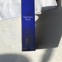 Front of the sealed blue box showing the brand 'Augustinus Bader' and product name.