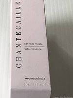 Front of the product box showing brand, product name 'Essence Vitale Vital Essence', Aromacologie line, and size 50ml 1.7 fl oz.