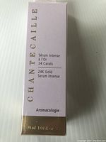 Front view of sealed box showing brand, product name, line and volume.