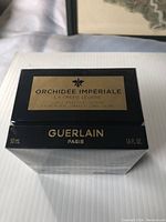 Front of sealed Guerlain box with Orchidée Impériale La Crème Légère label