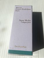 Front view of sealed Maison Francis Kurkdjian Aqua Media fragrance box showing name, volume 35 ml, and eau de parfum label.