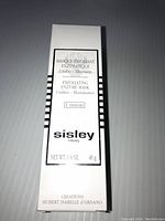 Closed white box of Sisley Paris Exfoliating Enzyme Mask showing front panel with product name, size, and branding.