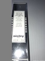 Photo of Sisley All Day All Year Essential Anti-Aging Protection skincare box, showing product name and size on front.