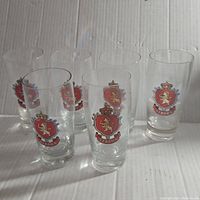 Set of six clear vintage Stroh's beer glasses arranged in two rows on a white background.