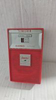 Front view of the vintage Sinclair Dino gas pump radio showing the Sinclair Dino branding and faux pump meter