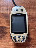 Front view of the Magellan eXplorist 210 GPS receiver, showing screen and controls