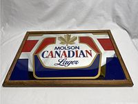 Front view of Molson Canadian Lager beer mirror sign with wood frame, showing full logo and colors.