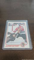 Front of 1981-82 OPC Tony Esposito hockey card showing action image of Tony Esposito goalie with Chicago Blackhawks.