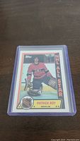 Front view of the 1988-89 Topps NHL All-Star sticker card featuring Patrick Roy in goalie gear.
