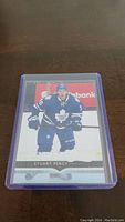Front of the Stuart Percy YoungGuns Rookie hockey card featuring player in Toronto Maple Leafs uniform.