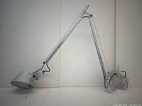 Side view of lamp fully extended on wall mount