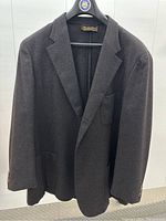 Front view of coat on hanger