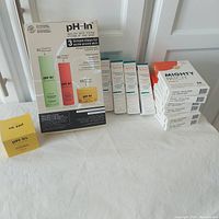 Full view of lot with PH-In Healthy Skin System box and individual Ultra Soothing Mask, four boxes of Avene Cleanance Comedomed, and six boxes of Hero Mighty Patch.