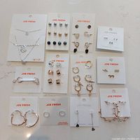 Full overview of all jewelry cards showing earrings and necklaces