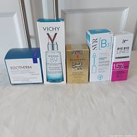 Photo showing all five skincare products in their original boxes.