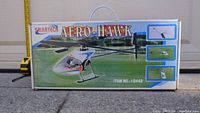 Front of the box showing the Smartech Aero-Hawk RC helicopter model image and branding.
