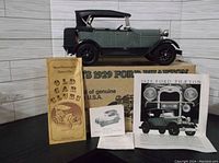 Porcelain 1929 Ford Phaeton decanter displayed with original box, documentation, and a wooden plaque depicting The Old Car Club by Beam Distilling.