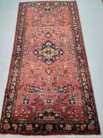 Top-down view of entire rug showing overall design and colors