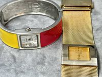Close up of the two Studio Time watches, highlighting details on the dials and bands.