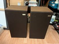 Front view of the pair of Sony SS-955 speakers with brown fabric grills and Sony logo.