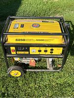 Left-front angle view showing generator in frame with wheels and handle