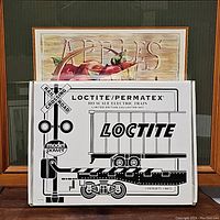 Model Power branded white box with black graphics showing Loctite/Permatex HO scale electric train limited edition set.