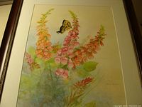 Full view of the watercolor painting showing foxglove flowers and butterfly with signature, framed and matted