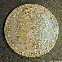 Obverse side of the 1883-S Morgan Silver Dollar showing Lady Liberty left-facing profile with date 1883.