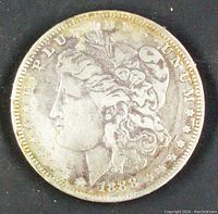 Obverse side of the 1888-O Morgan silver dollar showing Lady Liberty profile and inscriptions.