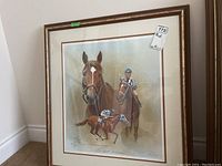 Full view of framed print showing three horse racing scenes