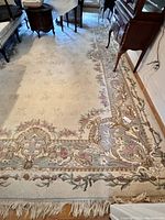 Full view of rug in room among furniture