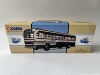 Corgi Classics GM 4502 Pacific Greyhound Lines diecast bus in original box showing detailed box artwork and branding.
