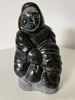 Front view showing full figure and base