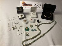 Overview of all jewelry items laid out on table