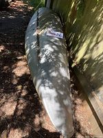 Underside view from bow toward stern showing full length and riveted center seam